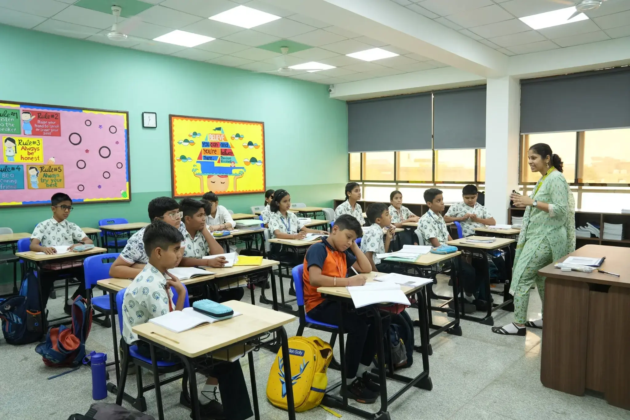 a teacher teaching in a classroom