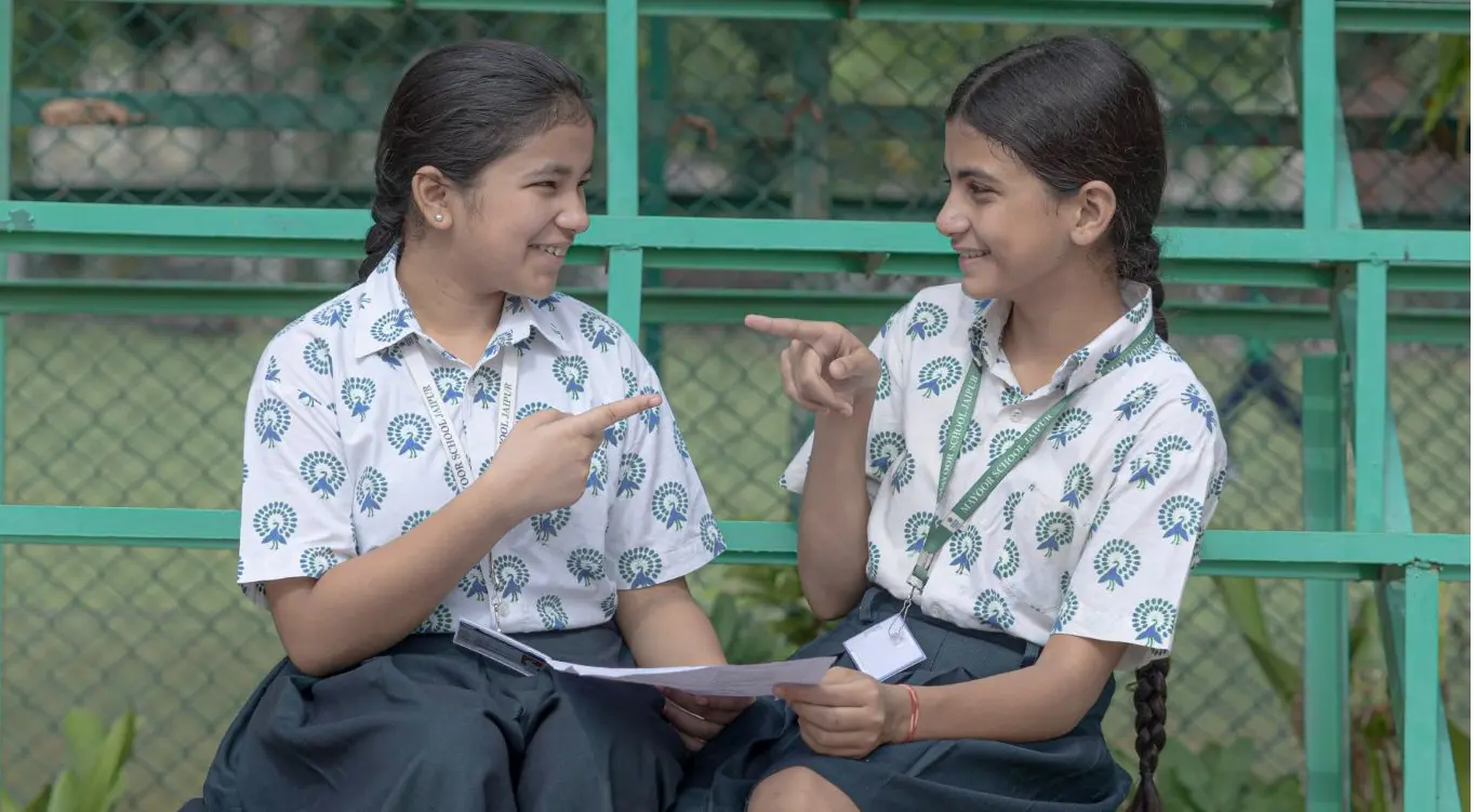 students studying near playing area