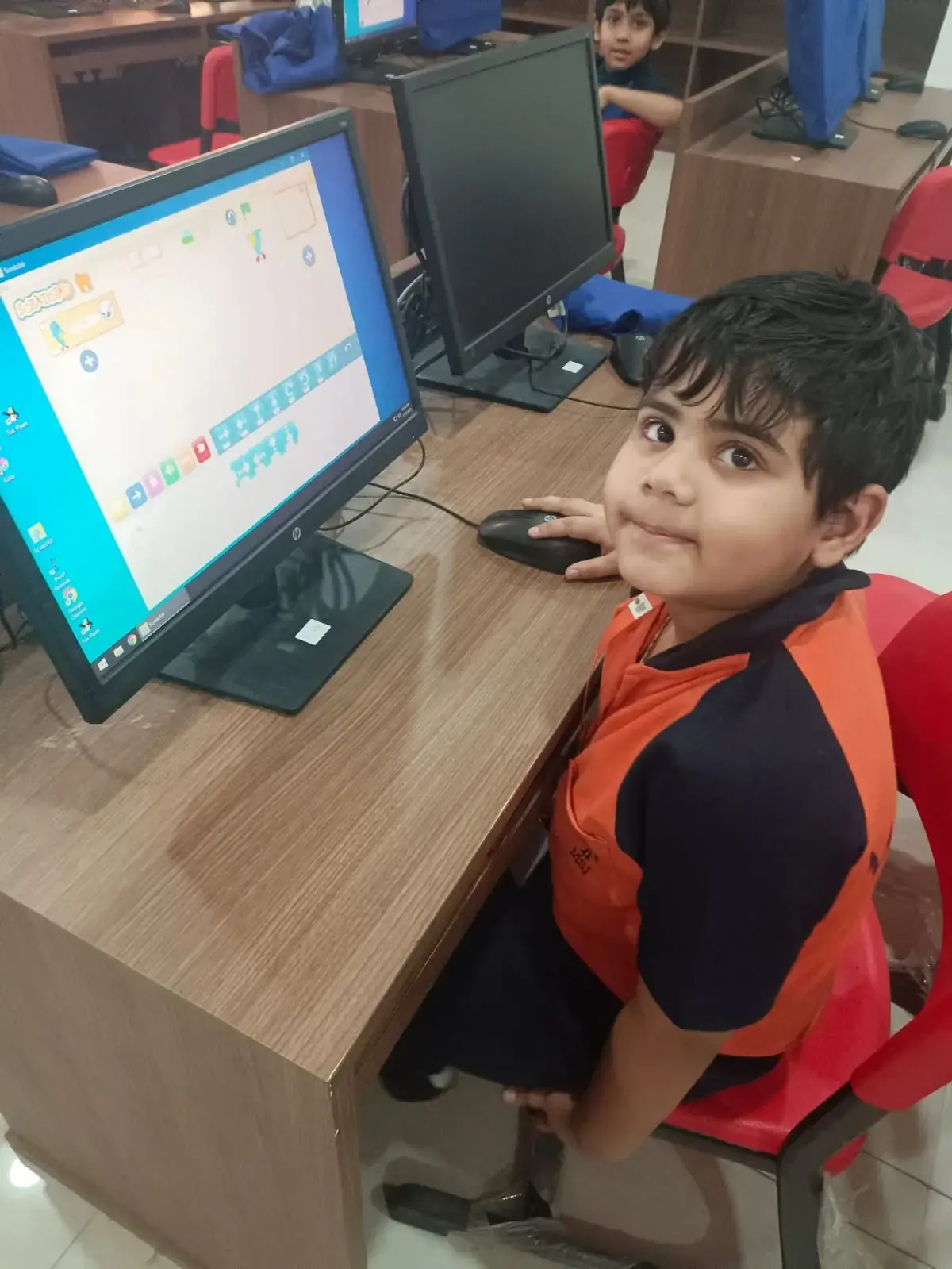 student of Mayoor School sitting in the computer lab