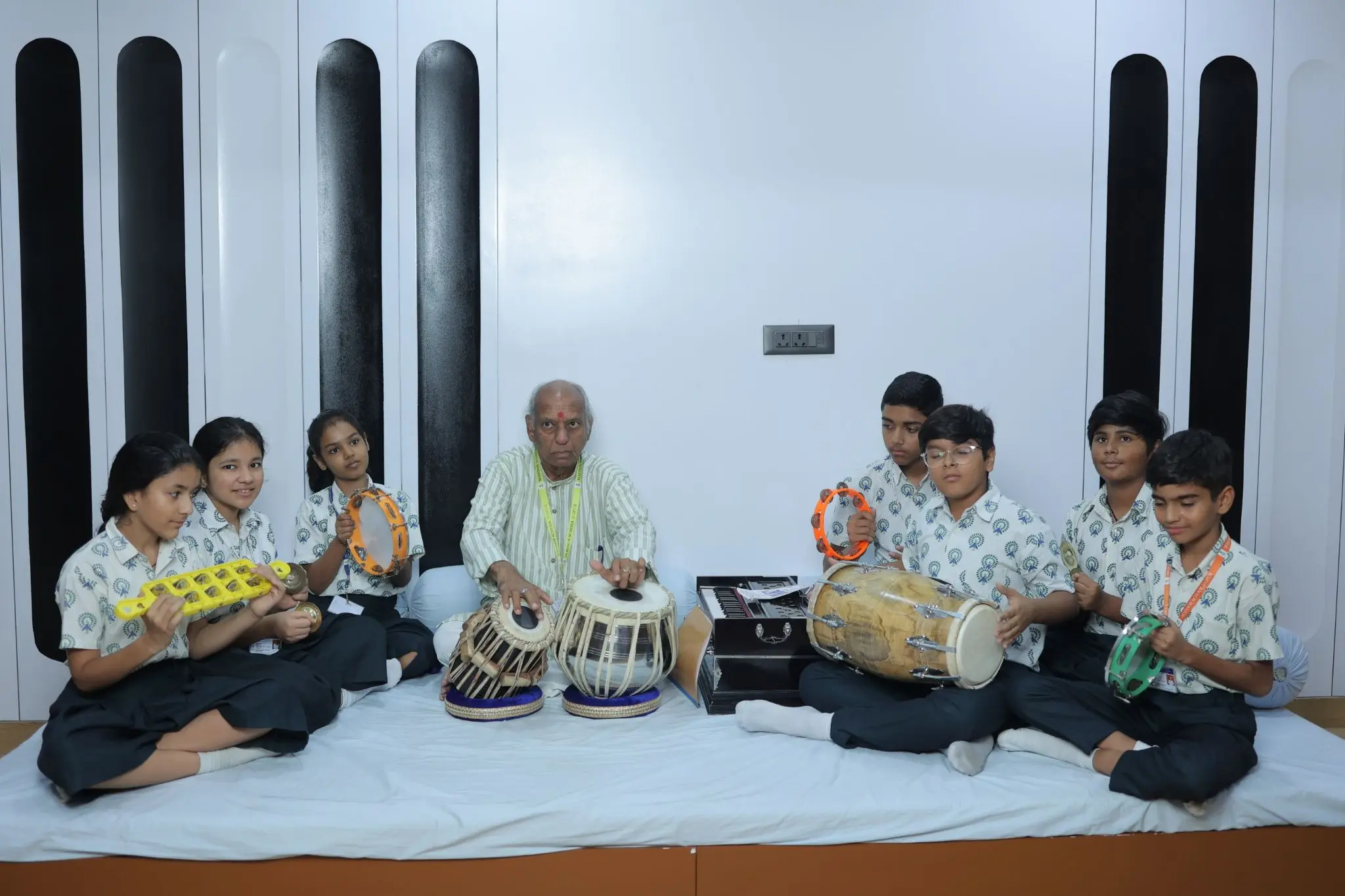 students enjoying in a music room