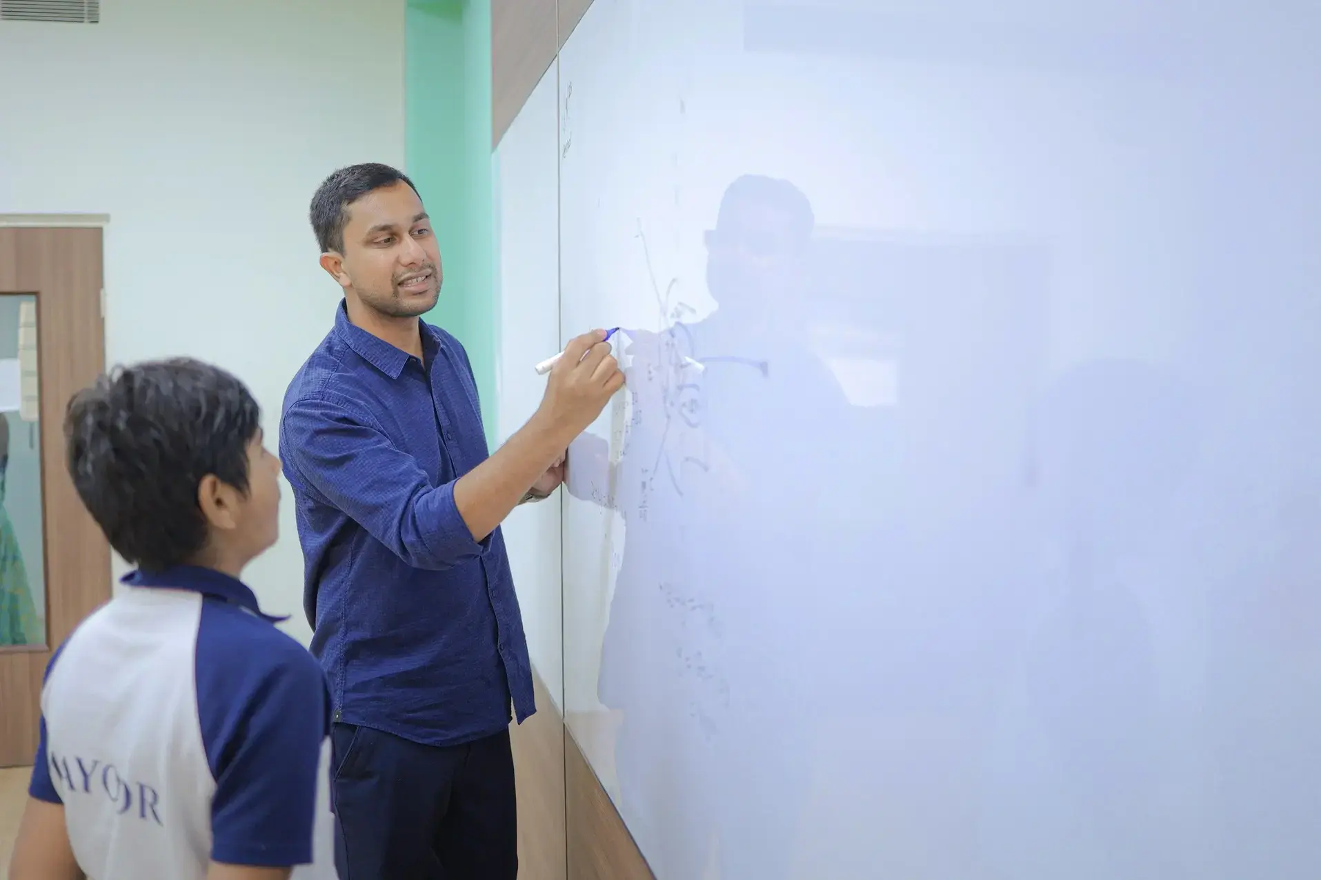 Mr Naman Kandoi Teaching a student